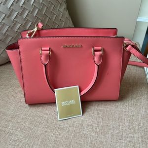 NWOT Micheal Kors Coral satchel/crossbody minor stain